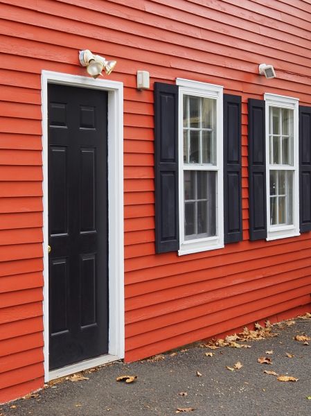 Red Vinyl Siding Installation in Wentzville